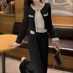 ブラック ジャケットとパンツのセットアップ