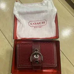 COACH 赤い二つ折り財布 折りたたみ財布 シグネチャー