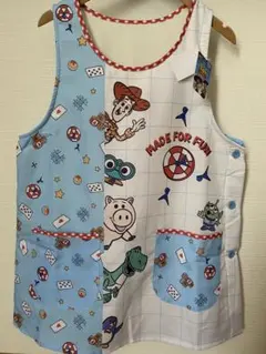 ディズニー・ピクサー　トイストーリー　エプロン M〜Lサイズ　水色　裏ボア