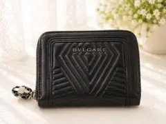 BVLGARI セルペンティ 財布 未使用 専用箱・正規保証カード付き - メルカリ