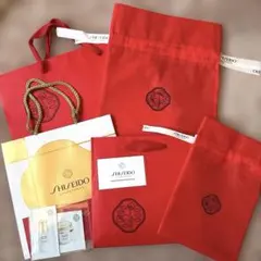 【美品】SHISEIDO ショップ袋　赤　大小　金巾着セット　サンプル付きのサムネイル
