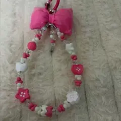 ピンクのリボンビーズ携帯ストラップ