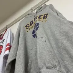 SABER BASKETBALL プリント プルオーバー パーカー グレー