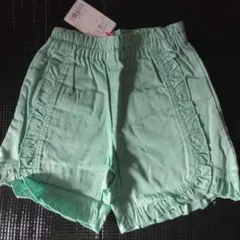 KP タグ付き新品　緑色のショートパンツ（110）