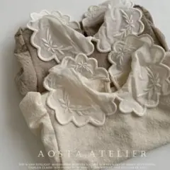 aosta トップス