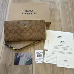 新品✨ COACH 長財布 シグネチャー ストラップ付 ベージュ ユニ