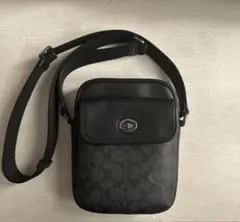 値下げ COACH エリアス ボディバッグ・シグネチャー キャンバス - メルカリ
