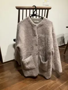 薄いピンク フリースジャケット ボタン付き