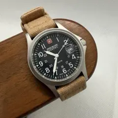 中古]スイスミリタリー レディース腕時計 ブルー系文字盤×水色布ベルト 