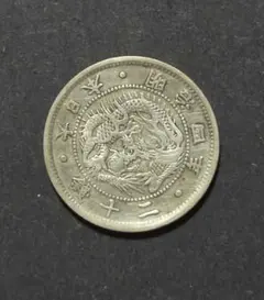 687）【希少・欠銭貨】旭日竜20銭銀貨（明治4年） - メルカリ