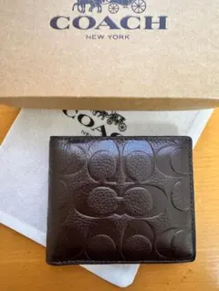 新品未使用 COACH コーチ シグネチャー エンボスレザー 二つ折り財布 茶