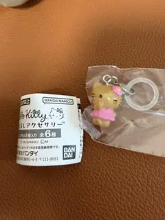 ハローキティ　めじるしアクセサリー　サンリオ　日焼け　ver. カプセルトイ