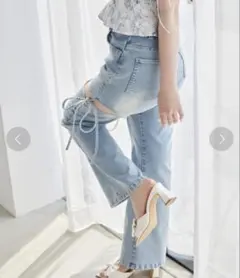 NICE CLAUP サイドオープンリボンフレアデニムパンツのサムネイル