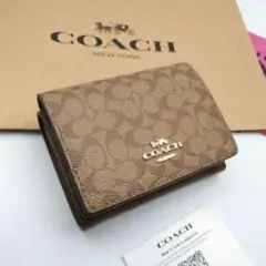 新品　COACH　折り財布　３つ折り財布　レディース　人気の小銭入れ付き