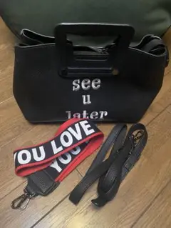 ブラックレザー調バッグ「see u later」