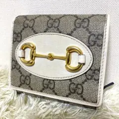 極美品 グッチ 二つ折り財布 ホースビット GGスプリーム 金具 ロゴ