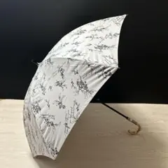 新品タグ付 【ジル スチュアート】金木犀柄 晴雨兼用 長傘 手元伸縮 遮光グレーのサムネイル