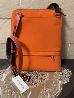 【新品】カルバンクライン　ショルダーバッグ オレンジ 牛革　28,600円