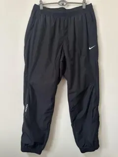 NIKE NOCTA 下のみ ナイロンパンツ黒 Lサイズ - メルカリ