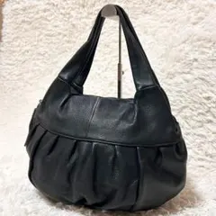 【極美品】SPICE ADDICT シボ革 黒 ハンドバッグ タッセル付き