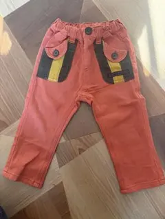 オレンジ色ポケット付きパンツ90