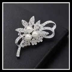 ブローチ パール 結婚式 卒業式 クリスタル シルバー リボン フォーマル