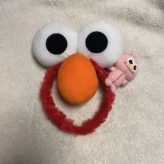 エルモ カチューシャ ピンクのぬいぐるみ付き