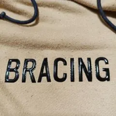 オーバーサイズパーカー　光沢のあるロゴBRACING 　　ベージュ