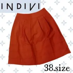 a18〚INDIVI〛 オレンジ 3段重ねフレアスカート 38サイズ