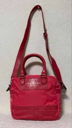 美品】MOSCHINO レッド ハートキルティング 巾着 ポーチ - メルカリ