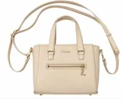 & chouette フリル付きピンクハンドバッグ　Rチャーム付き