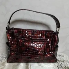 コッコ　フィオーレのハンドバッグ