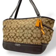 良品 コーチ トートバッグ 肩掛け キャンバス ブラウン シグネチャー チャーム