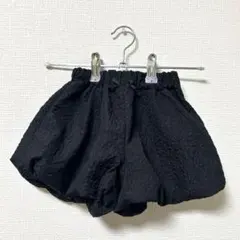 黒い花柄パンツ