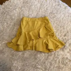 プティマイン　スカート　マスタード　フリル　110