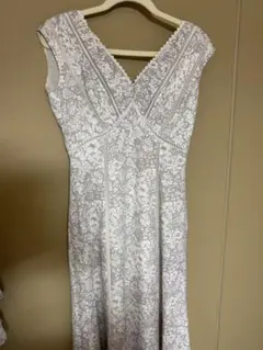 Her lip to lace trimmed floral dress