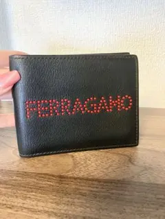 【激レア】美品 ！フェラガモ二つ折り財布 ブラックレッド マイクロスタッズ ロゴのサムネイル