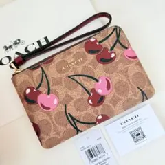 COACH コーチ ポーチ財布　コーナージップリストレット ブラウン　チェリー柄