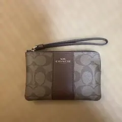 COACH ブラウン ロゴポーチ ハンドストラップ付き