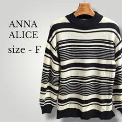 ANNA ALICE 黒と白のボーダー柄長袖ニットセーター ワイド ハイネックのサムネイル