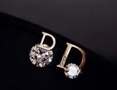 Dロゴピアス ゴールド czダイヤ