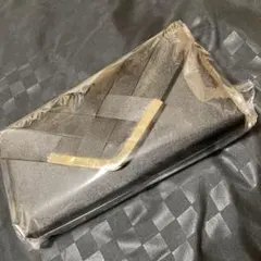 ブラック編み込みクラッチバッグ