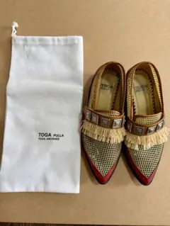 TOGA VIRILIS