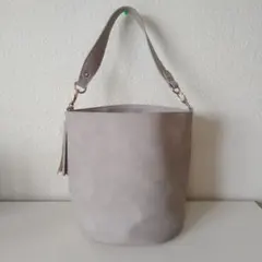 スエード風 巾着バッグ タッセル ワンハンドル