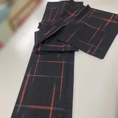 十日町紬　袷　正絹　仕立て上がり　太絣　黒地×赤絣　パールトーン加工済み