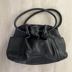 極美品【COLE HAAN】コールハーン バッグ 巾着 シボ レザー ブラックのサムネイル
