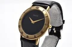 稼働 GUCCI グッチ メンズ腕時計 黒文字盤 ゴールド ローマンベゼル