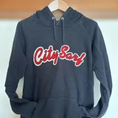 Rodeo Crowns City Say パーカー