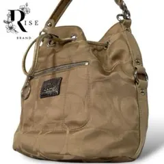 【鑑定済】コーチ ワンショルダーバッグ 巾着型 肩掛け シグネチャー ベージュ