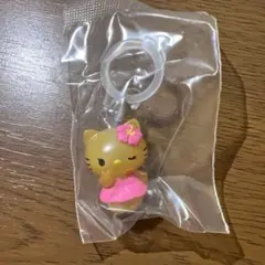 【新品未開封】ハローキティ めじるしアクセサリー　日焼け　ガチャ
